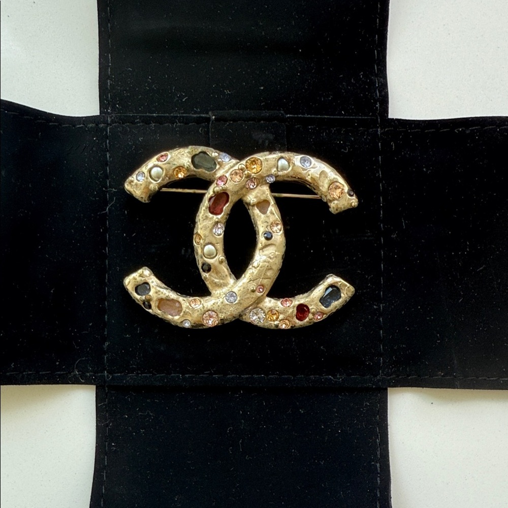 CHANEL Gold Brooch with Jewel Tones